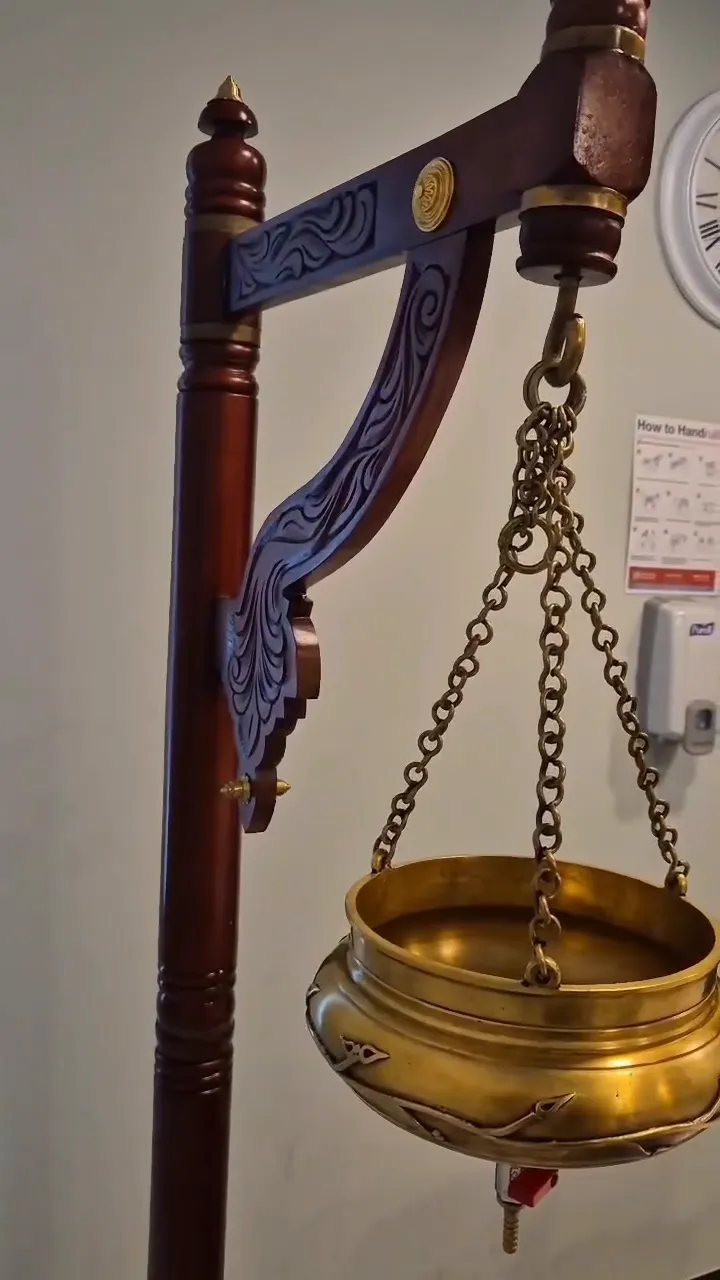 Brass Shirodhara vessel used for Ayurvedic oil therapy